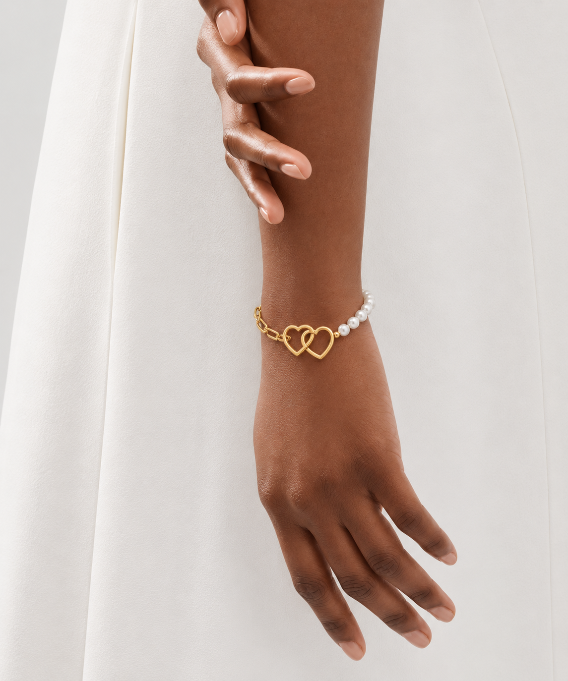 Pulsera Dos Corazones con Perla